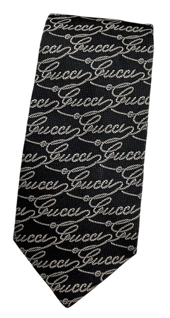 ブランド：グッチ 商品名：ネクタイ 原産国：ITALY 付属品：なし サイズ：全長約146cm 剣先約9.8cm カラー：ブラック 素材：シルク100％ 程度：A'(USEDきれいめ） コメ